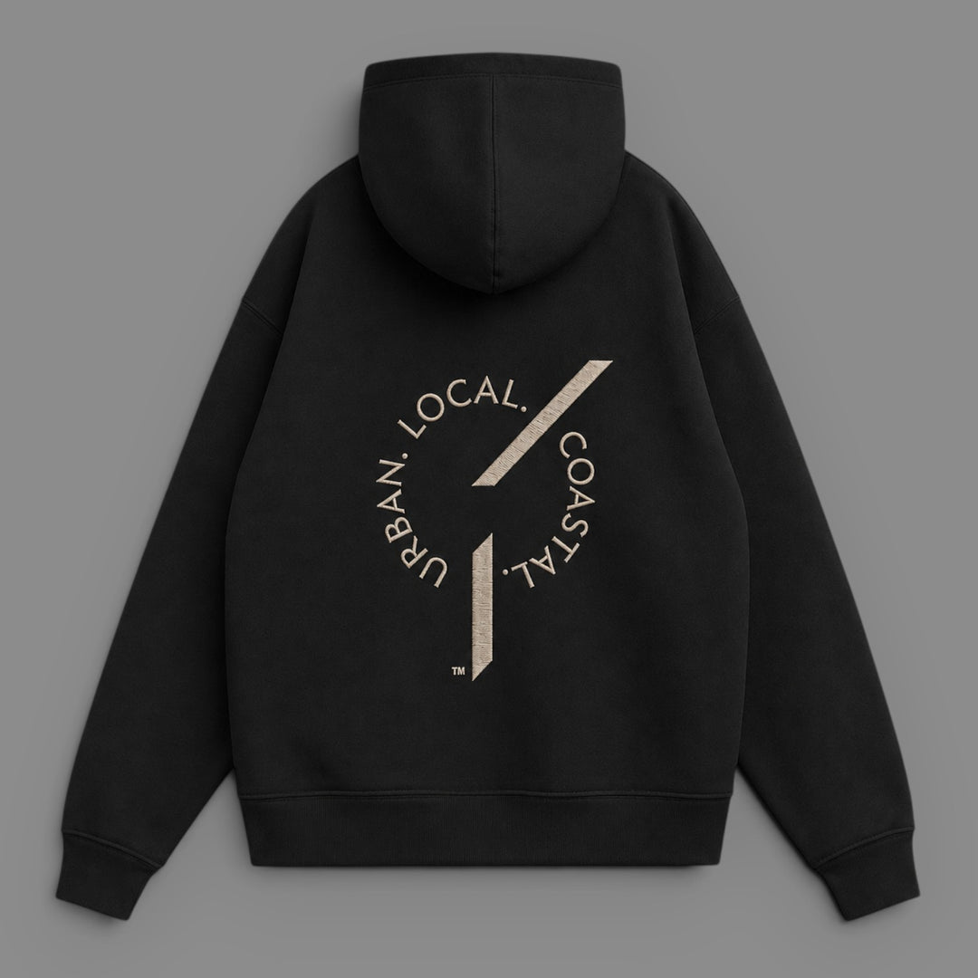 Back view of area 609 black heavyweight organic cotton hoodie with embroidered logo on the back