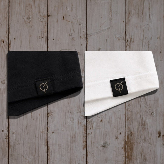 area 609 cotton t-shirt sleeves featuring a custom black woven label with a sand colored Core Emblem logo