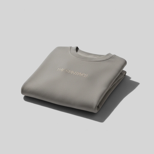 area 609 The Standard Faded Crew sweatshirt in ash grey with embroidered chest logo, folded on white background