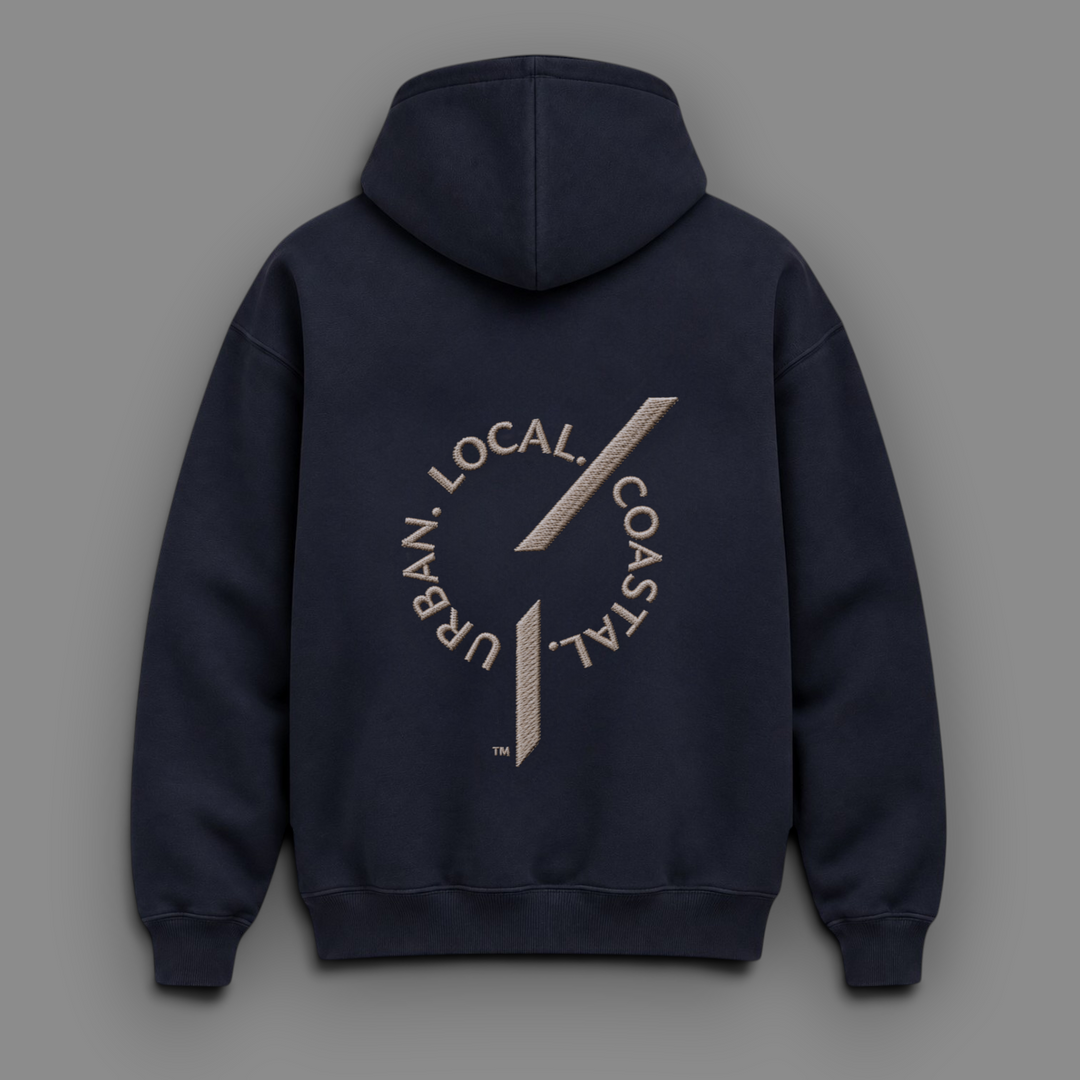 Back view of area 609 The Founders Preservation Hood in ink navy blue with circular Urban Local Coastal embroidery