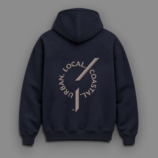Back view of area 609 The Founders Preservation Hood in ink navy blue with circular Urban Local Coastal embroidery