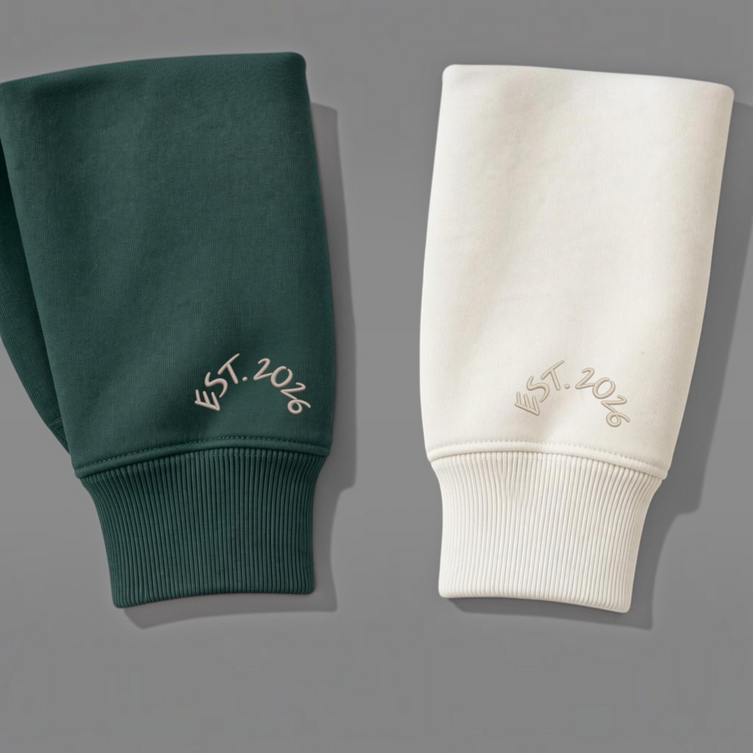 area 609 organic cotton quarter zip cuffs in ivy and parchment with signature sand embroidery logo detail