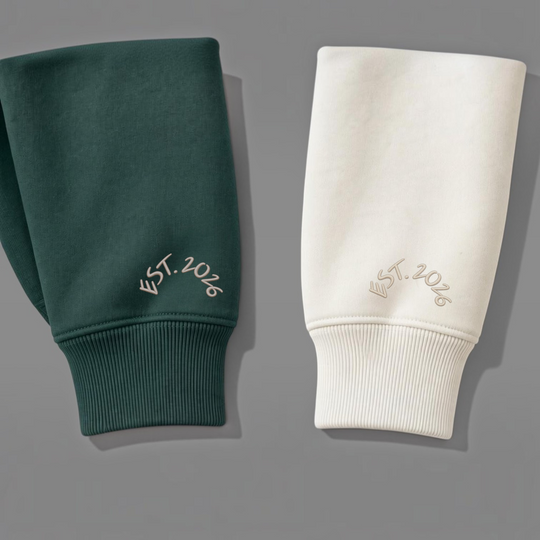area 609 organic cotton quarter zip cuffs in ivy and parchment with signature sand embroidery logo detail