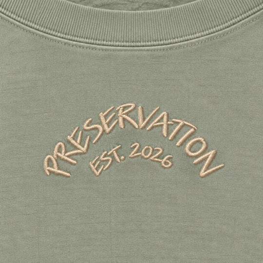 area 609 sage green crewneck sweatshirt with embroidered Preservation arch text and EST 2026 detail